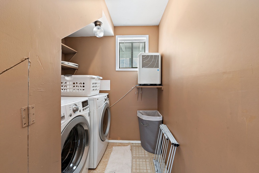 Spice up your laundry routine with a fiery ambiance in the laundry room