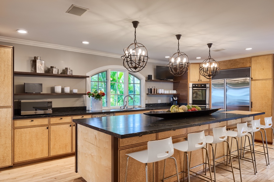 The kitchen is built to enhance the flow of entertainment, family, and big groups that want to enjoy their time together,