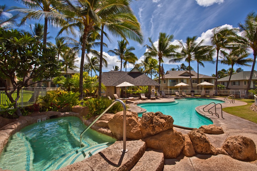 Make memories at a sparkling pool nestled within lush greenery and tropical vibes.