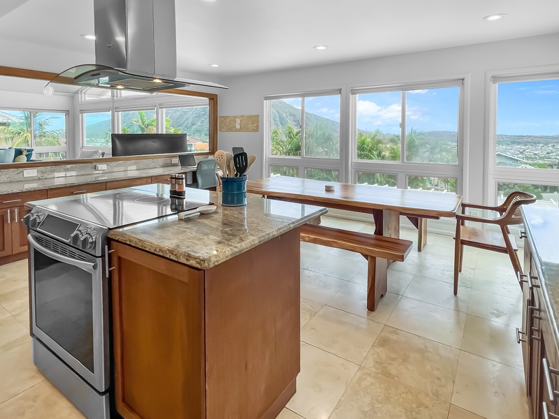 The kitchen features top-tier appliances and spacious counter space to prep meals in a breeze!