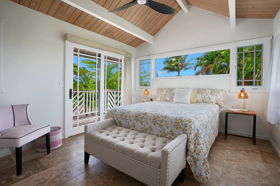 The second Guest Bedroom is located upstairs and offers a king bed and tropical views