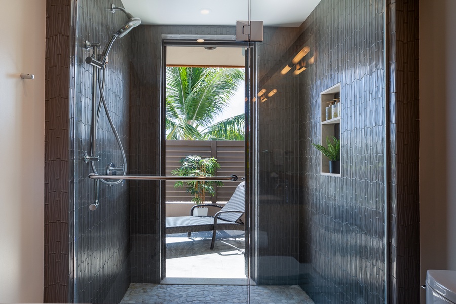 A walk-in shower at the secondary ensuite bathroom with instant access to the balcony