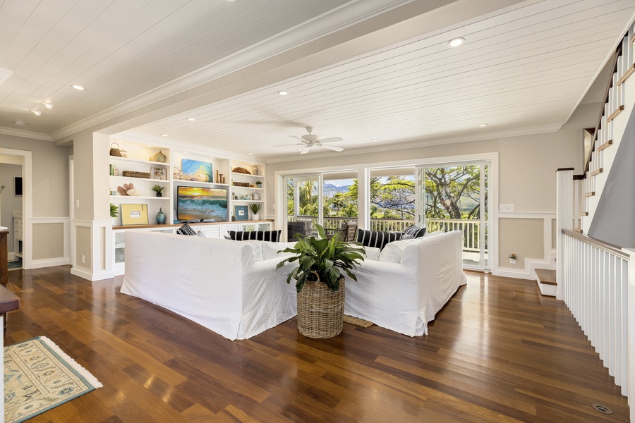 Spacious living area with a lanai overlooking the pool