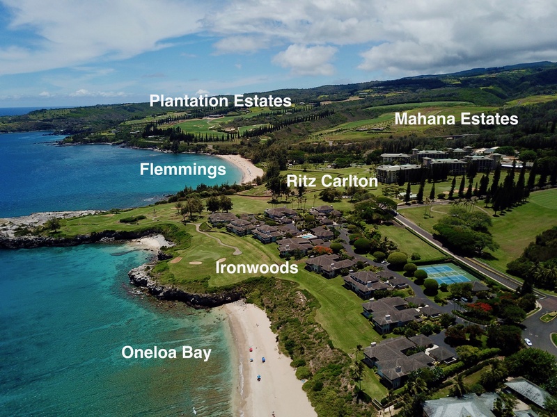 This aerial view highlights the beautiful proximity of Oneloa Bay, Flemings, and nearby resorts, offering easy access to pristine beaches and luxurious amenities.