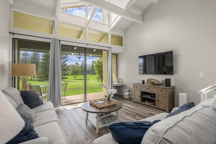 Stylish living room with golf course and mountain views