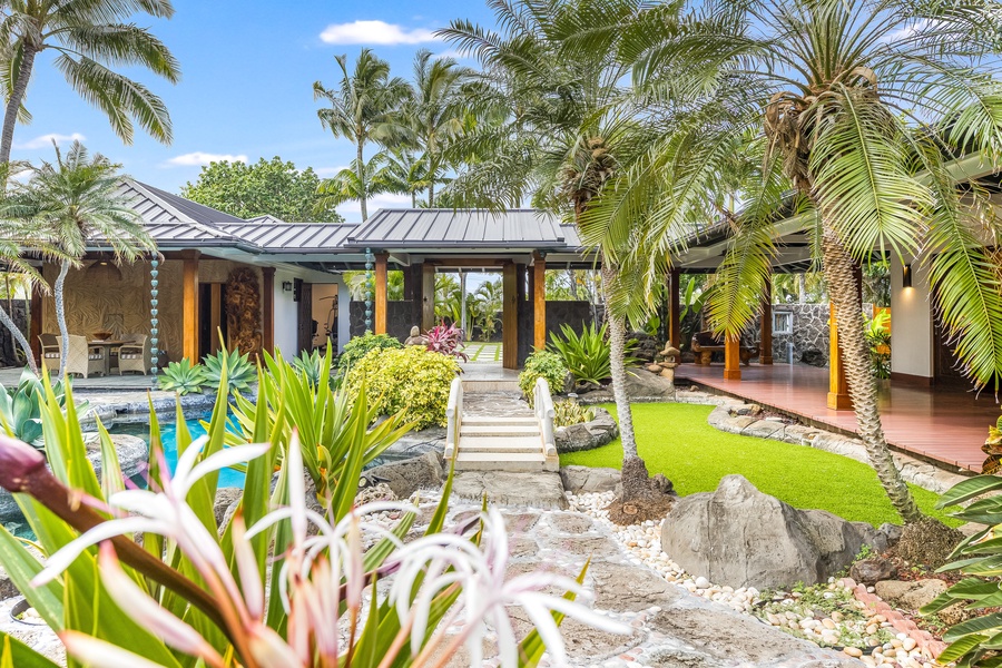 Lush landscaping frames the estate, creating privacy and a sense of true island seclusion.