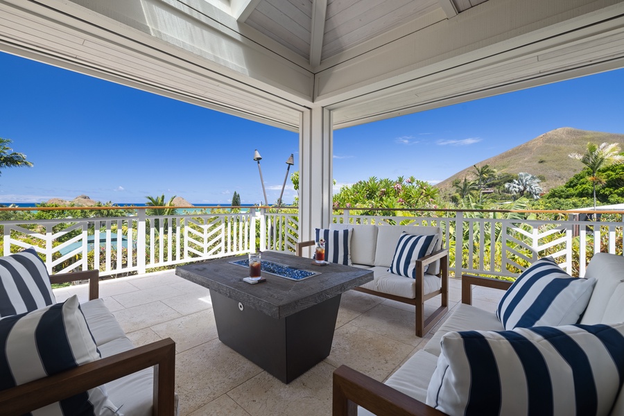 Relax on the main floor lanai with ocean views.
