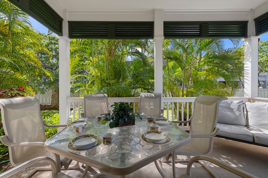 Covered lanai connected to the primary suite offers the perfect setting for al fresco meals.