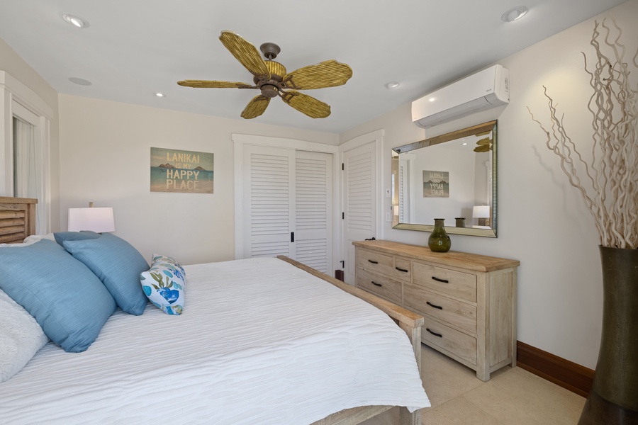 The downstairs guest bedroom five features a king-sized bed.