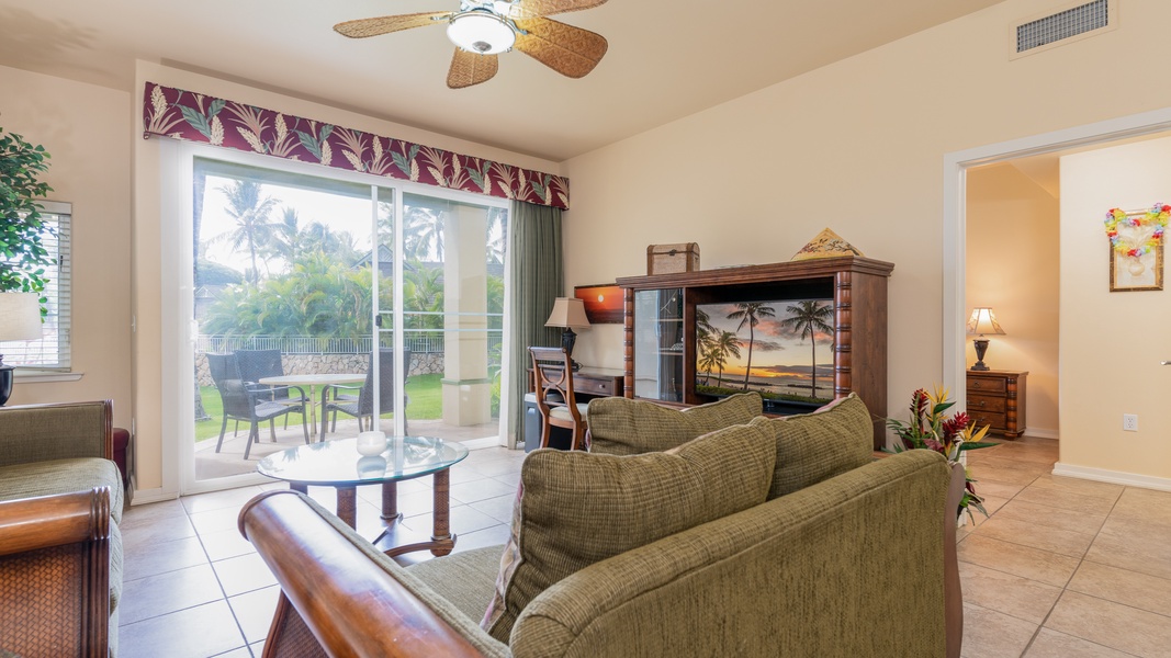 The open living area is comfortably appointed with natural lighting.