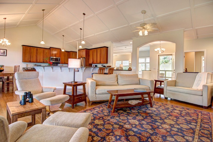Gorgeous interior with open concept living room and vaulted ceilings