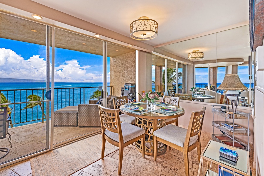 Enjoy your meals with a stunning ocean view from Royal Kahana 610's bright and inviting dining area.