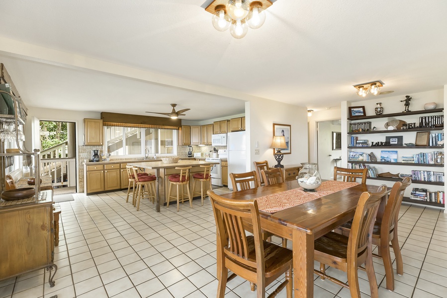 The dining area is adjacent to the kitchen with open living spaces.