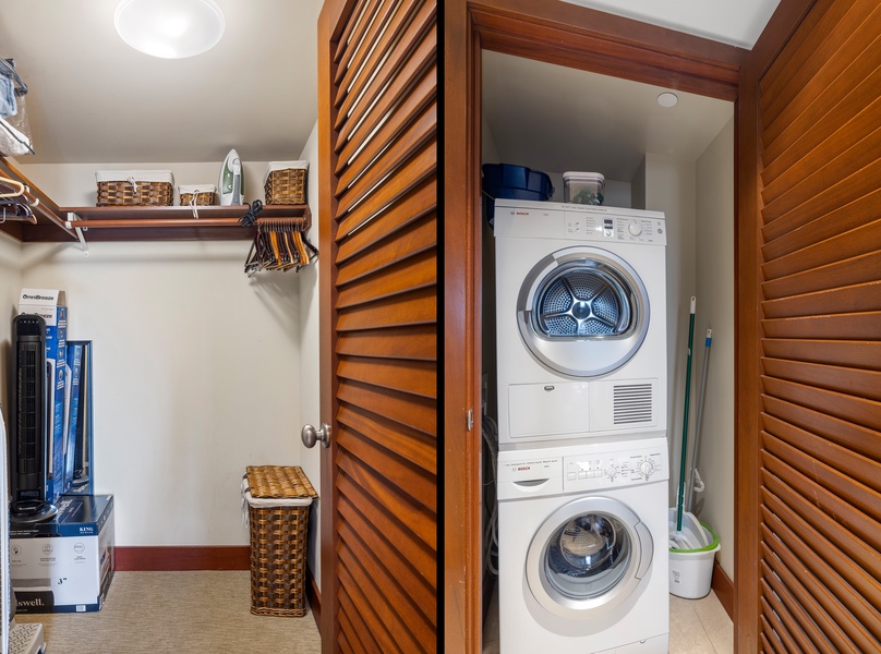 An in-unit washer/dryer with an adjacent storage room to keep your getaway essentials.