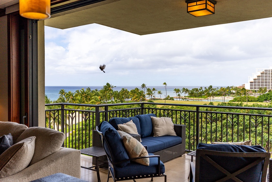 Relax on your private balcony with stunning ocean and palm tree views, perfect for morning coffee or evening cocktails.