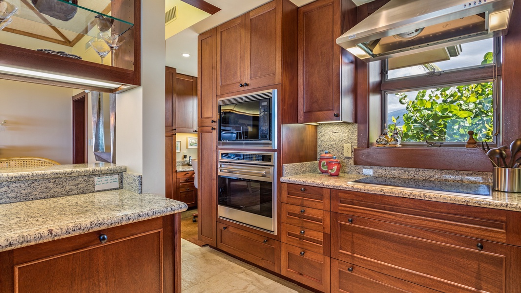 Stainless Steel Appliances & Gleaming Granite Countertops.