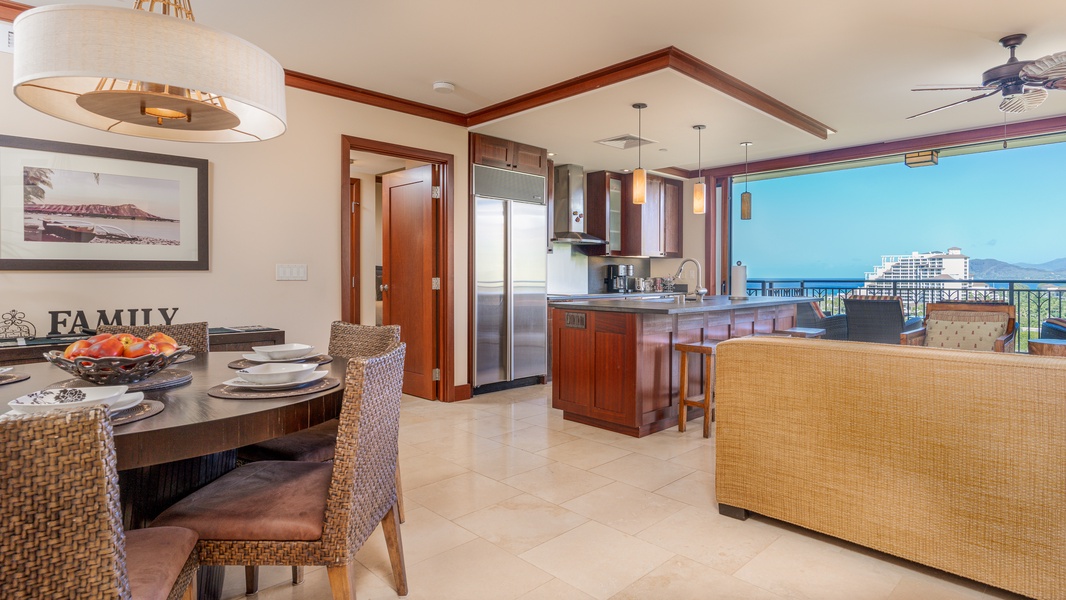 A view of the open floor plan with kitchen, dining and living areas.