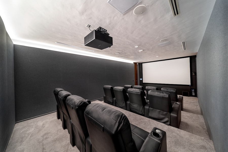 Enjoy movie nights in the home theater, complete with plush seating and audiovisual equipment.