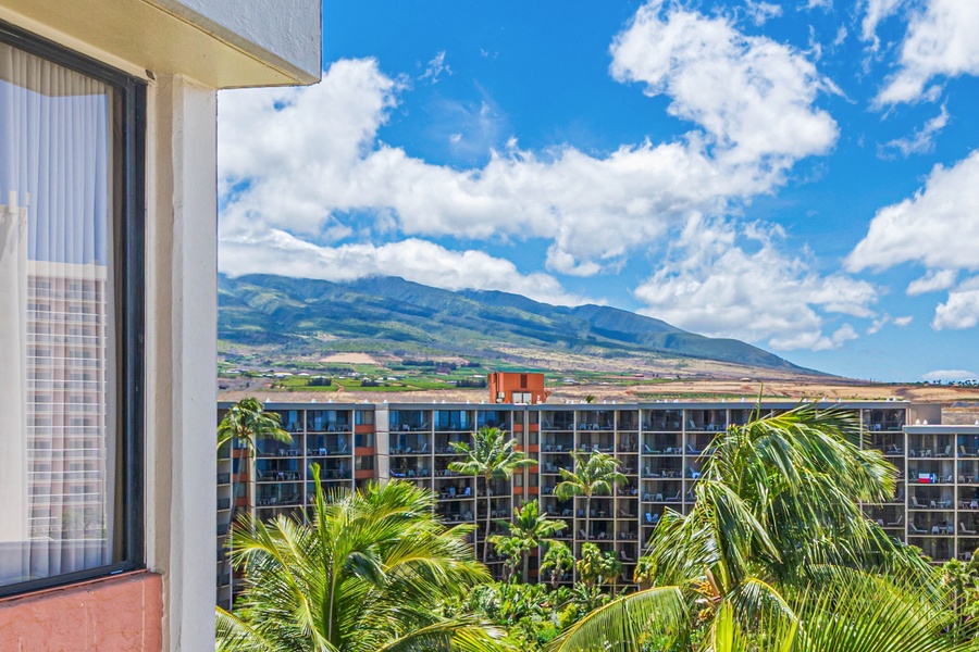 Take in stunning views of the lush mountains and surrounding resort grounds, offering a beautiful backdrop for your island getaway.