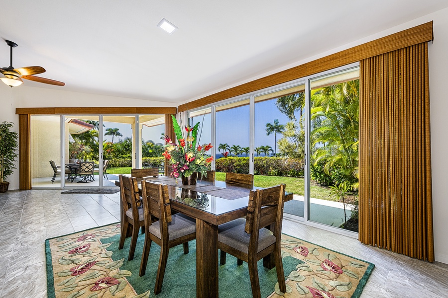 Sliding doors on the ocean side bring nature into the dining room