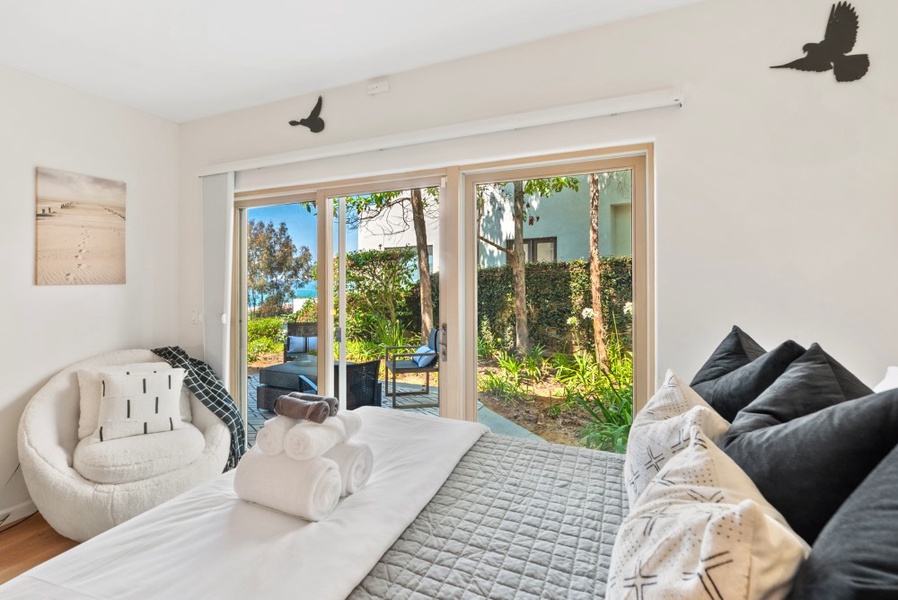 Bedroom #3 with patio and ocean view