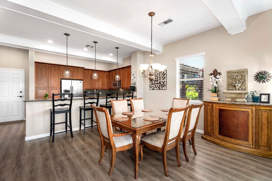 Dining area for six is open to the kitchen.