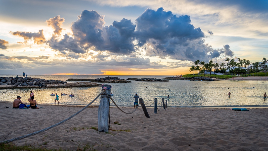 The scenic lagoon with sandy beaches and captivating skies.