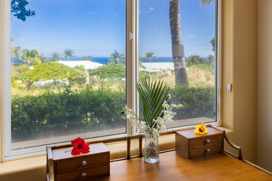 Enjoy writing postcards or catching up on emails with an ocean view at the writing desk