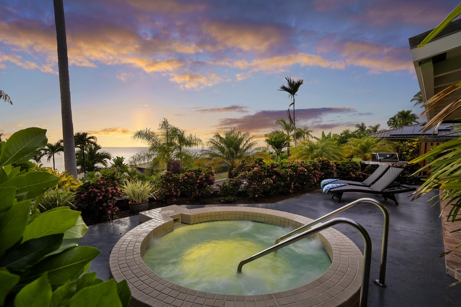 Enjoy the hot tub with the sunset on the horizon