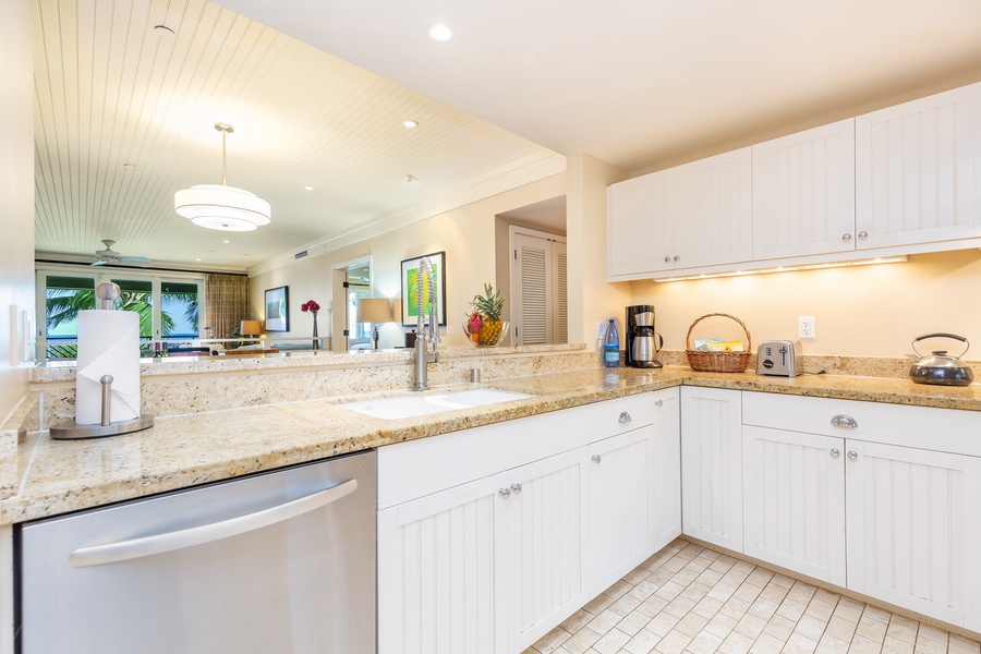 The kitchen features all of the appliances you’ll need to recreate your favorite meals and the high ceilings and fine finishes like Brazilian chestnut floors and granite and marble countertops throughout offer the perfect setting for your at-home dinner pa