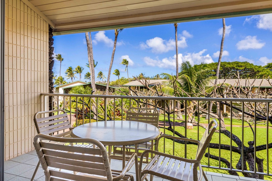 Enjoy the lush garden views from your private lanai, a perfect spot for morning coffee or evening relaxation.