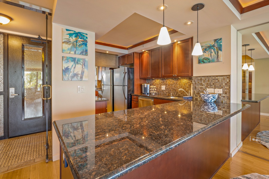 Spacious kitchen island with granite countertops, perfect for meal prep and entertaining.