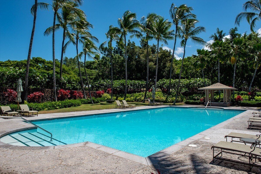 Waiulu Street Community Recreation Center featuring a heated pool, hot tub, BBQ area, shaded seating, and private restrooms.