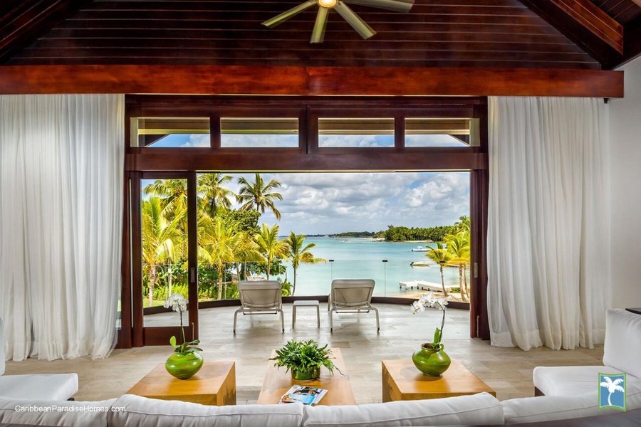 Relax in this beautiful lounge area with an expansive view of the ocean.