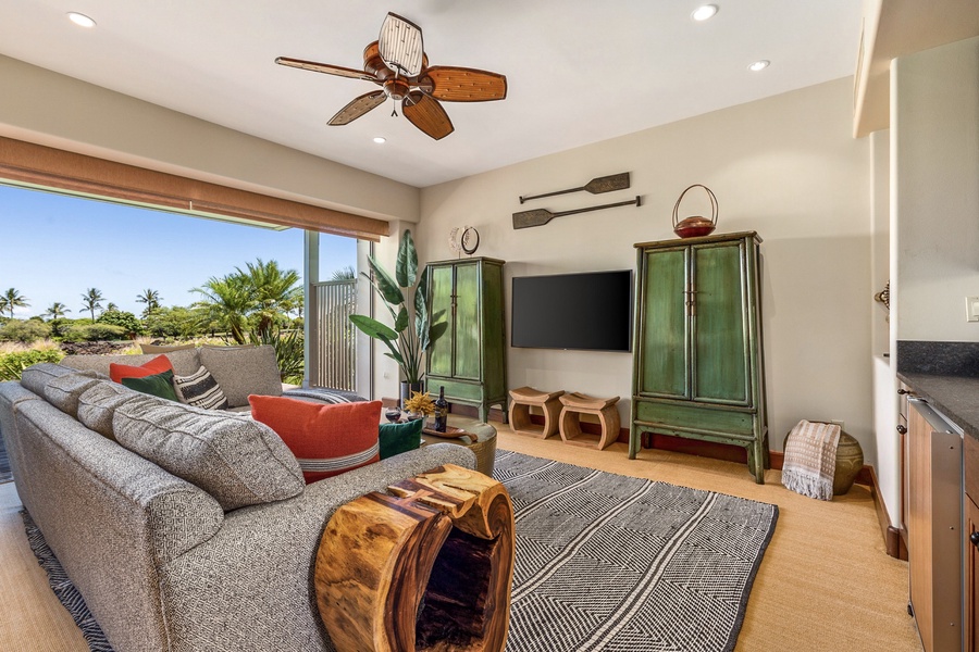 Bonus retreat room with queen sleeper sofa, deck, flat screen TV and wet bar.