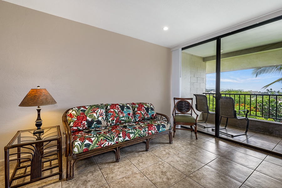 Tropically appointed Living room steps from the Kitchen & Lanai!