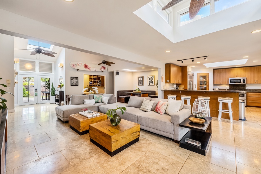 The living area opens up to the den and kitchen