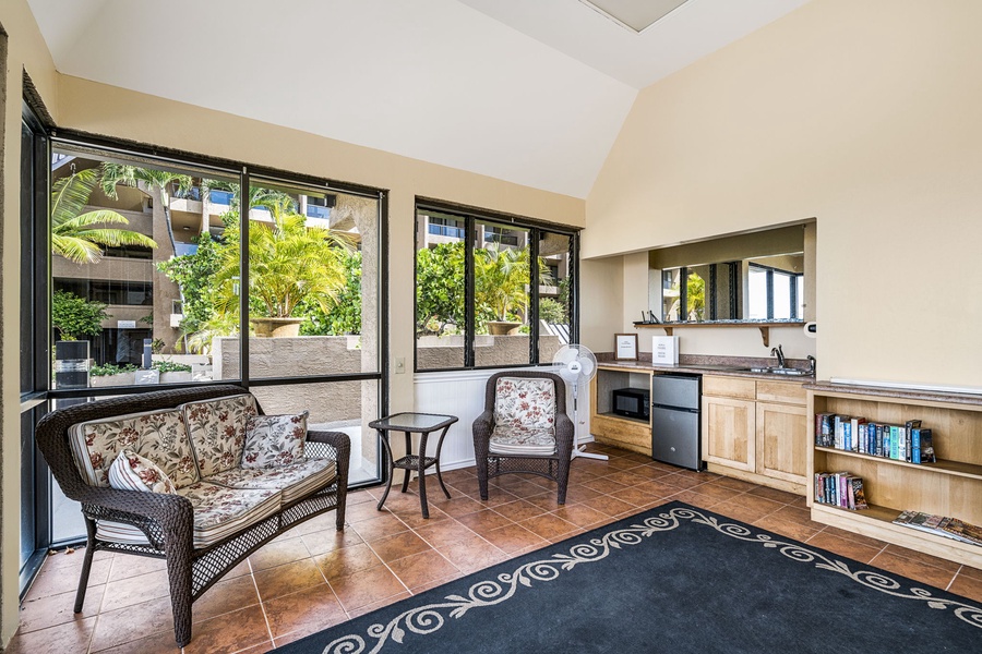 Common Area Comfortable seating area with a view of the outdoors for relaxation.