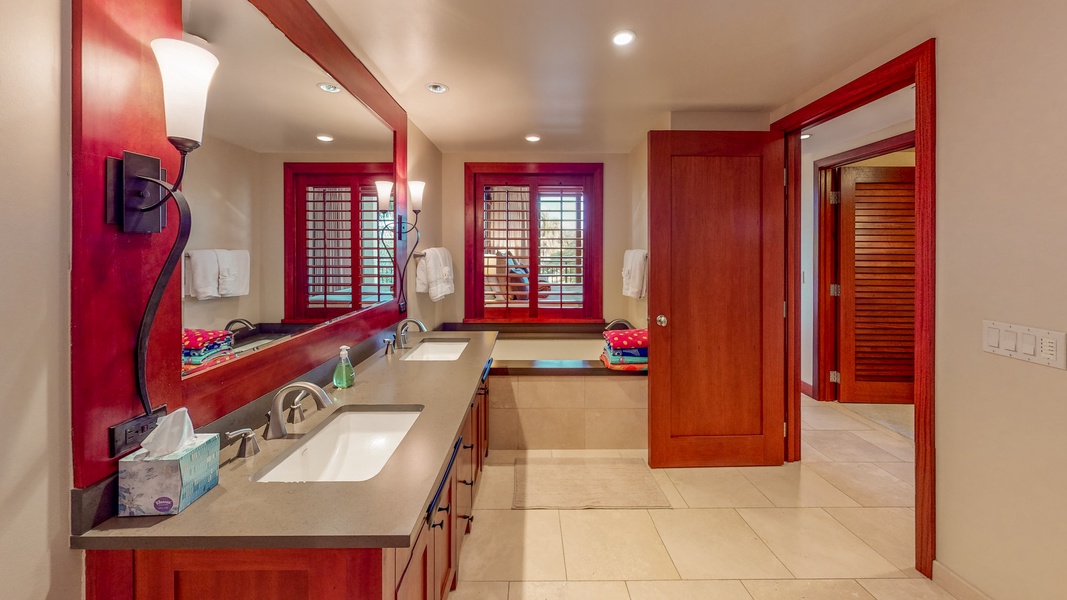 The spacious primary guest bath where you can relax and unwind.