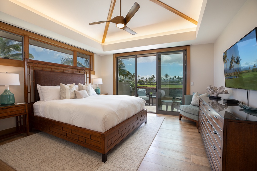 King bed primary suite with access to balcony to savor the morning breeze after a deep nightly slumber