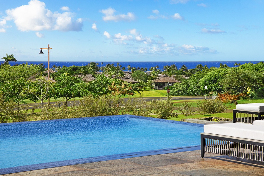 Dive into paradise: take a refreshing swim or soak in breathtaking vistas at the lanai.