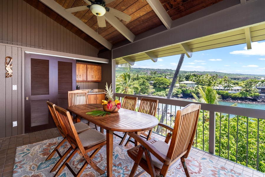 Covered lanai with dining for six and panoramic ocean views.