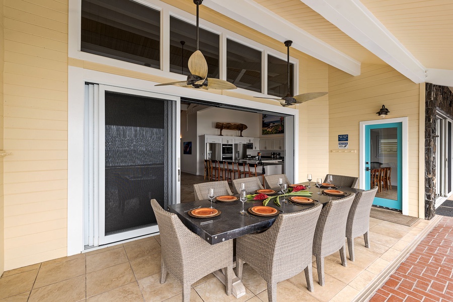 Dine on the covered lanai, where indoor-outdoor living flows with ease.