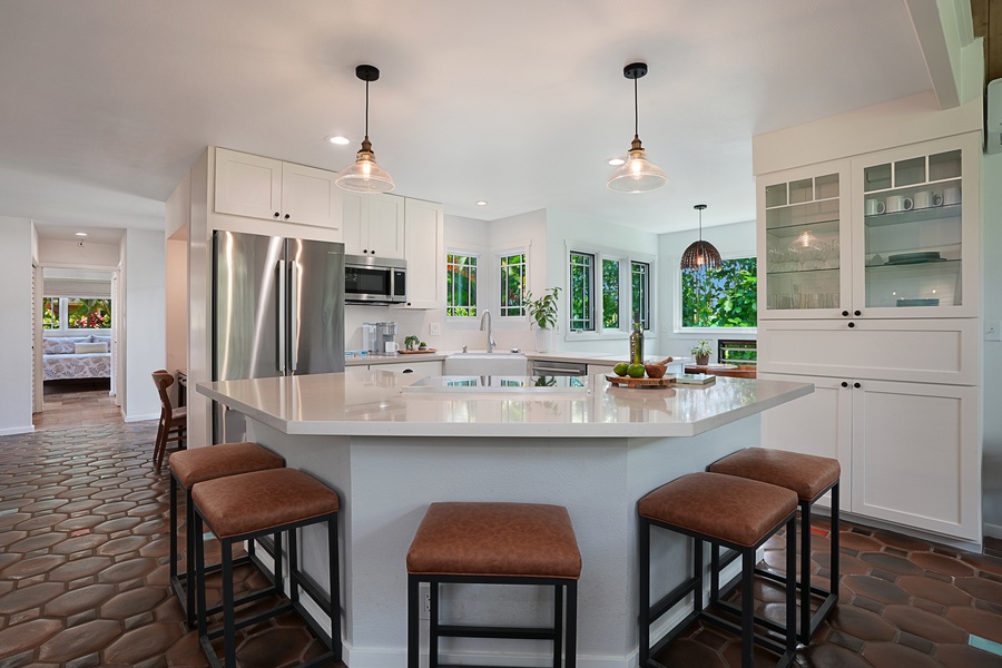 The huge kitchen island will be the perfect spot for cooking or entertaining friends