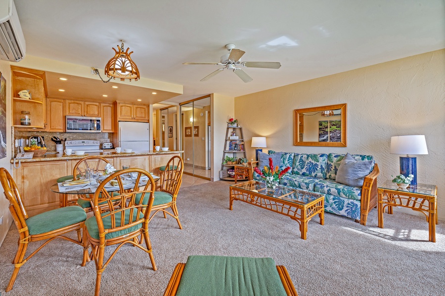 The open living area is perfect for relaxing, with comfortable seating and a direct connection to the kitchen.