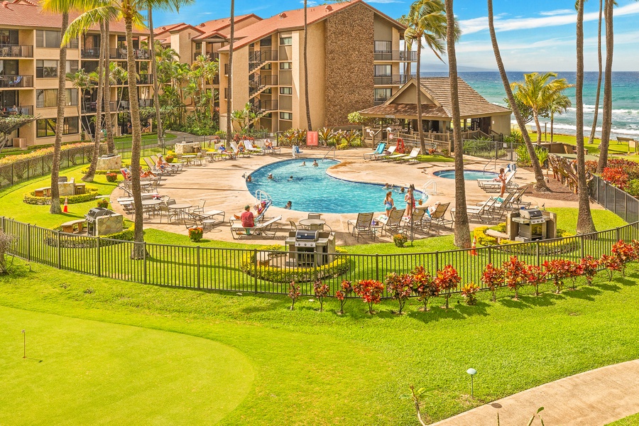 The resort's inviting pool area is surrounded by lush landscaping and offers stunning ocean views, creating a perfect setting for relaxation and fun.