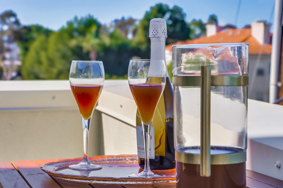 Savor a cool drink on the deck, where fresh air and scenic views create the perfect backdrop for relaxation.