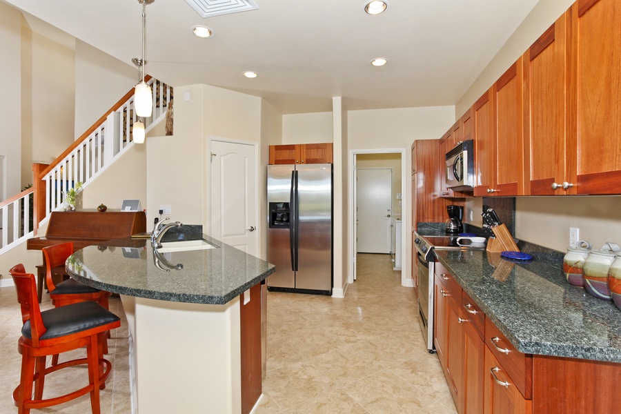 A beautiful kitchen with stainless steel appliances.