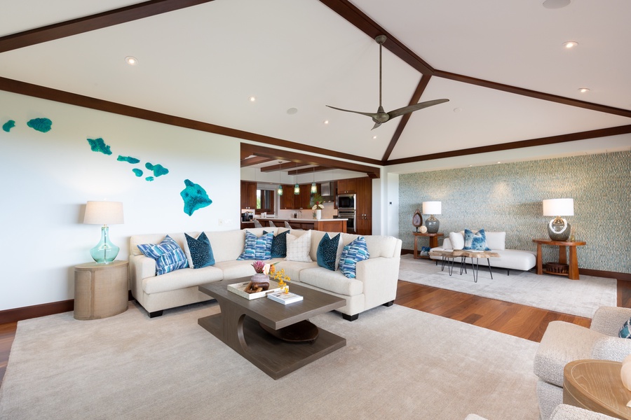Stunning great room with chic decor and vaulted ceilings