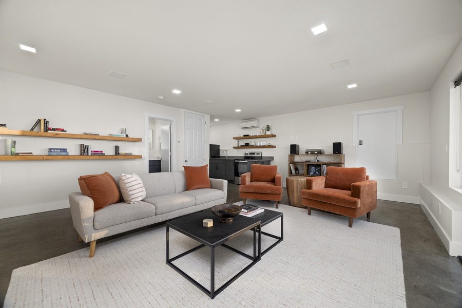 Expansive secondary living area with cozy furnishings and modern décor — ideal for groups or extended stays.